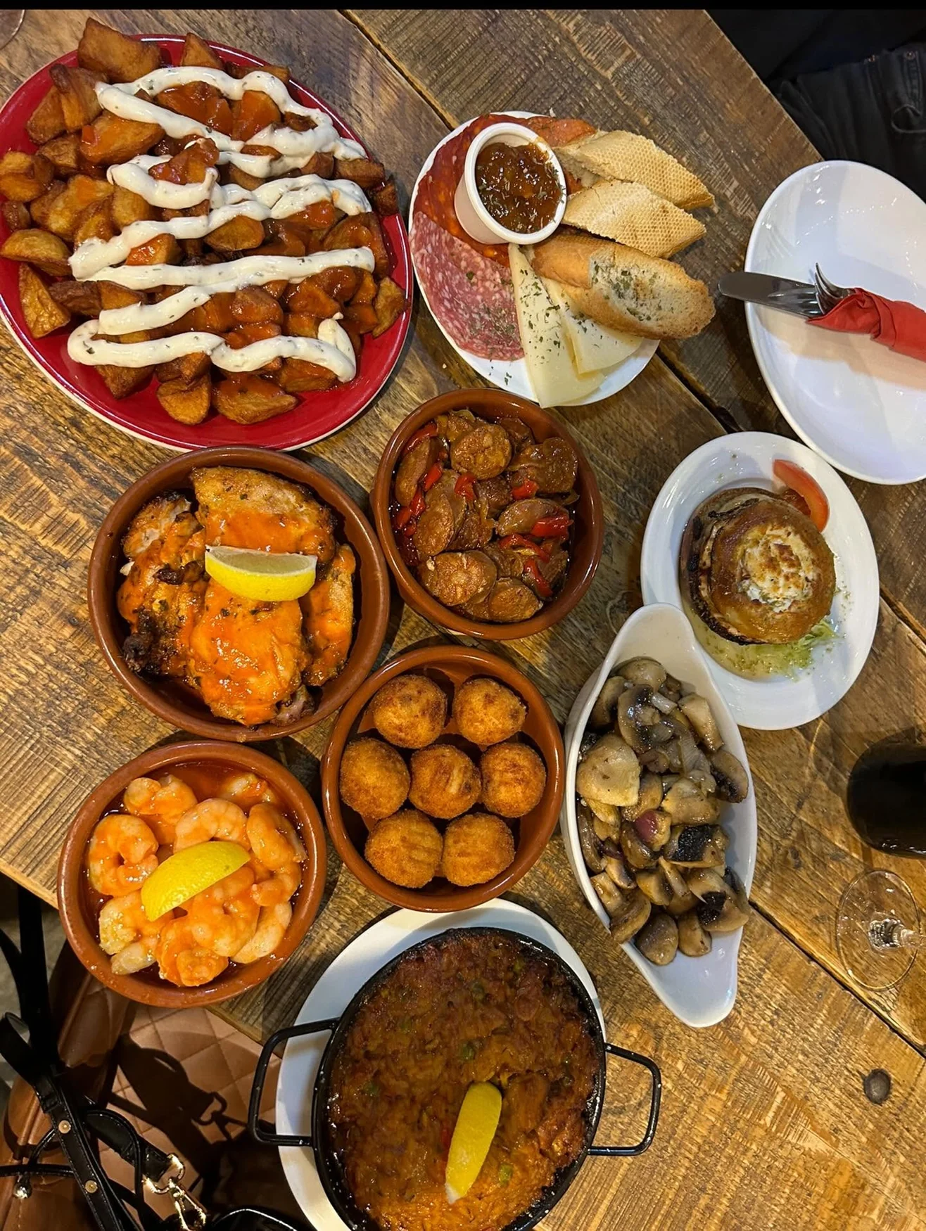 Spanish tapas dishes on a shared table