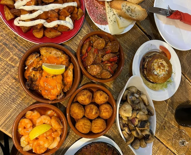 A selection of Spanish tapas dishes on a table